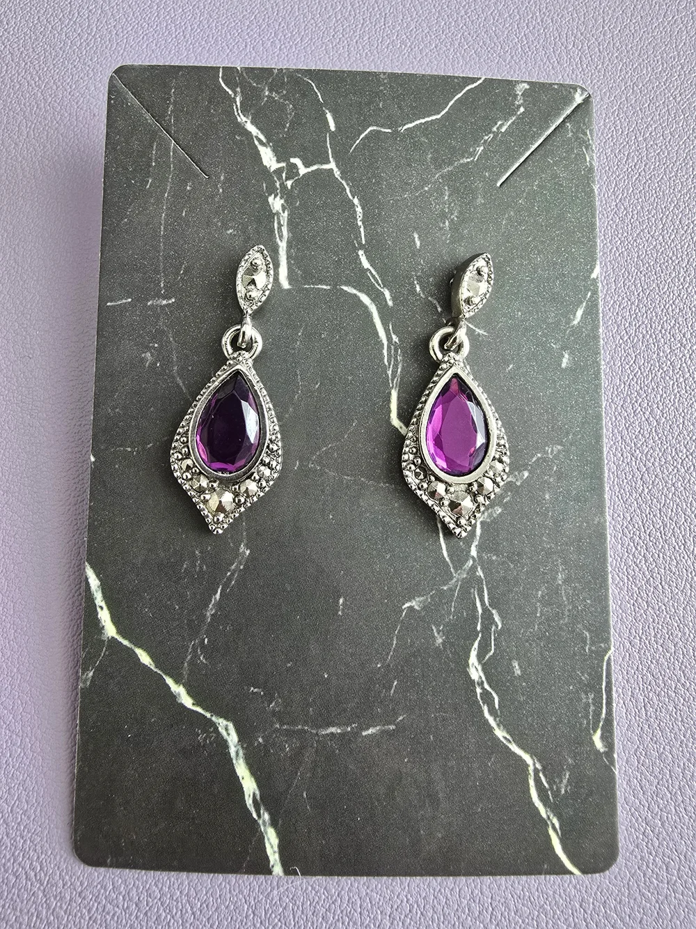 Elegant Silver Drop Earrings with Purple Teardrop Gem